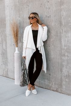 Our "Everyday Style" oversized cardigan jacket is so cozy and cool! This classic cream pocketed cardigan features an open front and long sleeves. Throw this piece on with the "Lamar" tank bodysuit and the "Liam" denim black jeggings! Oversized Jacket Model is 5"7 in a size small Fall Outerwear Pieces Cream Knit Cardigan Open Front Pockets Colors May Vary Patterns May Vary Trendy Cream Long Sleeve Sweater Coat, Cream Long Sleeve Sweater Coat Trendy, Trendy Long Sleeve Cream Sweater Coat, Winter White Long Sleeve Cardigan With Pockets, Winter White Long Sleeve Loungewear Cardigan, White Long Sleeve Cardigan For Loungewear, Trendy Long Sleeve Sweater Coat For Day Out, Cozy Long Sleeve Outerwear For Day Out, White Cardigan With Pockets For Layering