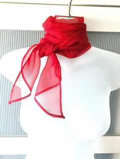 "Stylish red burgundy organza scarf with pointed ends from 70s. The scarf is long and can be used as a neck wrap, headband, sash, bag decor or any other piece of accessory to match your dress, shirt or jacket. The scarf is in excellent/mint condition and will make a beautiful gift. It comes in a gift wrap and with a \"Thank you' card. For more scarves in my store visit: https://www.etsy.com/ca/shop/NostalgicByLiliya?ref=seller-platform-mcnav&section_id=25031148 For other items visit: https://www Classic Red Silk Scarves, Classic Silk Scarf For Formal Summer Events, Elegant Red Scarf For Formal Occasions, Elegant Red Silk Scarf For Party, Party Scarves In Organza, Elegant Red Silk Scarf For Summer, Elegant Red Silk Scarf For Wedding, Classic Red Silk Scarf, Solid Color Silk Scarf For Formal Summer Occasions