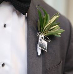 a boutonniere with a plant attached to it