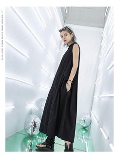 Sku CY-!25870 Material >60%Cotton Style Loose , Sleeveless Occasion Casual , Urban , Simple Seasons Summer Type Maxi Dresses Color BLACK,KHAKI Size FREE SIZE Please consult the size chart we provide for this item's measurements to help you decide which size to buy.Please note: There may be 1-3cm differ due to manual measurement. INCH Bust Waist Shoulder Length FREE SIZE 38.58 52.76 15.35 47.64 Black Cotton Sleeveless Summer Dress, Chic Black Sleeveless Cotton Dress, Casual Black Sleeveless Dress, Black Sleeveless Dress With Buttons For Spring, Casual Black Sleeveless Dress With Buttons, Black Sleeveless Button Dress For Summer, Sleeveless Long Dress, Elegant Casual, Khaki Dress