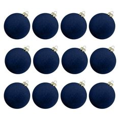 twelve navy blue christmas ornaments with gold trim