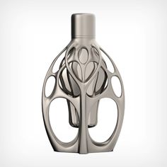 a silver vase with an intricate design on it