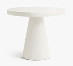 a white round table with one leg on the top and two legs on the bottom