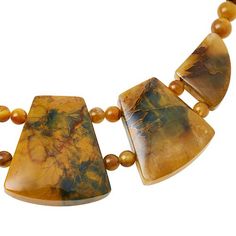 Jay King Sterling Silver Golden Quartzite 18" Necklace Go for the bold, beautiful look of natural gemstones when you accessorize with this handcrafted Golden Quartzite necklace. The unique stone features varying shades of golden yellow and green with an intriguing, dark matrix.       Necklace approx. 18"L x 5/16"W with 2-3/4" extender     Drop approx. 1-11/16"L x 1-1/2"W     Stamped .925     Hook closure     Necklace drape has five geometric-shaped stations of multicolor "golden quartzite" strung together and connected via two strands of round, quartzite beads     Single strand of round, multicolor quartzite beads complete necklace   Stone Information       All sizes and weights approximate     Stabilized Golden Quartzite - Freeform (21x26mm to 38x42mm), round (6-8mm); mined in China     T Elegant Jasper Gemstone Bead Necklaces, Elegant Jasper Gemstone Beads Necklace, Elegant Jasper Gemstone Beaded Necklace, Yellow Necklaces With Natural Stones And Round Beads, Yellow Necklaces With Natural Stones In Round Beads, Yellow Necklaces With Natural Round Beads, Earthy Agate Gold Necklace, Yellow Agate Gemstone Jewelry, Unique Jasper Gold Necklace