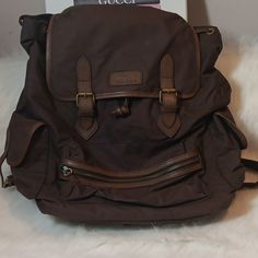 Brooks Brothers Canvas Brown Backpack With Genuine Leather Trim. Double Buckle Fastening With Drawing. Spacious Inside And 1 Zip Pocket. Exterior: 2 Side Pockets And 1 Zip Pocket. Adjustable Shoulder Straps. Normal Wear. Pre-Owned In Good Condition Rugged Brown Leather And Canvas Backpack, Brown Canvas Backpack With Zipper Closure, Brown Waxed Finish Shoulder Backpack, Rugged Brown Standard Backpack, Photo Backpack, Brown Backpack, Brooks Brother, Brown Backpacks, Vintage Canvas