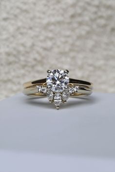 an engagement ring with three stones on it