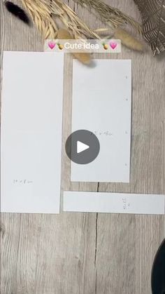 the video is showing how to make a photo book with paper and scissors on it