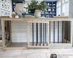 a wooden table with metal bars on it