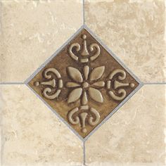 a tile floor with an ornate design on the top and bottom part, in beige tones