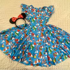 Beautiful New In Package (Took Out For Photos) Size 7/8 Disney Christmas Toy Story Twirl Dress. Unique Side Cut Cut Out. Great Soft, Quality Fabric And Amazing Twirl Factor. I Wish We Had Been Able To Wear This But It Didn’t Come In Time For Our Trip, Along With A Matching 3t Boys Tee And 9m Girls Dress (Also Listed). Little Wild Crowns. Perfect For Hollywood Studios This Christmas! Toy Story Christmas, Christmas Toy Story, Dress Unique, Twirl Dress, Side Cuts, Hollywood Studios, Boy Tees, Disney Toys, Disney Christmas