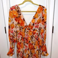 The Perfect Dress For A Fall Wedding Or Event. Long Sleeved With Ruching On The Sleeve And Waist. Depending On Height Would Be Full Length (I’m 5 Feet) Or Mid If Taller. Zips In The Back And Has A Tie At Neck. Never Worn. V-neck Floral Print Mini Dress For Wedding, Peach Floral Print Long Sleeve Dresses, Peach Long Sleeve Floral Print Dress, Floral Print V-neck Mini Dress For Wedding, Elegant Orange Floral Print Mini Dress, V Neck Dress, Orange Pink, Perfect Dress, Fall Wedding