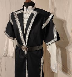 Kaftan for men with trim decoration. The pattern of the trim may differ from the photo!  Recommended also for LARP and reenactment events. Made with rustic fabric. It is made customized for every customer! Please note that above 90 kg/200 lbs for women and above 120 kg/260 lbs for men our products are made with an extra fee. Please order this listing as an addition: https://www.etsy.com/listing/1562690891/extra-cost-for-extra-size-production?click_key=8094f62d573a9ac48333de812216d36c4cc4ac02%3A1 Traditional Costumes For Costume Party And Cosplay Events, Historical Costumes For Cosplay With Historical Design, Traditional Fitted Costumes For Cosplay Events, Historical Design Costume For Cosplay At Medieval Festivals, Historical Costume For Medieval Festivals Cosplay, Historical Cosplay Costume For Medieval Festivals, Traditional Fitted Medieval Costume Dress, Traditional Fitted Medieval Dress For Costume Party, Fantasy Mens Outfits