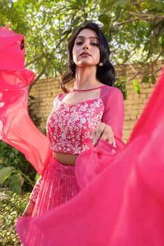 Crafted from high-quality georgette and net fabric, the Pink Layered Lehenga creates a gorgeous, flowy look that will make you feel like royalty. The layered design adds depth and dimension to the lehenga, creating a dramatic and ethereal effect.
The matching hand-embroidered blouse is the perfect complement to the lehenga, featuring intricate embroidery work that adds an extra layer of sophistication and glamour. The blouse perfectly balances the dramatic design of the lehenga, creating a look Elegant Chiffon Lehenga For Diwali, Designer Georgette Sets With Sheer Dupatta, Festive Georgette Sets With Sheer Dupatta, Designer Wear Sets With Sheer Dupatta In Georgette, Festive Chiffon Sets With Unstitched Blouse, Chiffon Sets For Diwali Party, Diwali Party Chiffon Sets, Chiffon Party Sets For Diwali, Bollywood Chiffon Sets With Zari Work