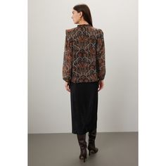 Black abstract chiffon (97% Polyester, 3% Metallic). Top. Long sleeves. Tie closure. 25.5" from shoulder to hemline. Made in the USA of imported fabric. Elegant Flowy Blouse For Fall, Chic Long Sleeve Blouse With Abstract Print, Flowy Blouse For Workwear In Fall, Flowy Blouse For Fall Workwear, Fall Printed Blouse For Workwear, Flowy Fall Workwear Blouse, Fall Workwear Blouse With Abstract Print, Fall Workwear Printed Blouse, Chic Printed Viscose Blouse