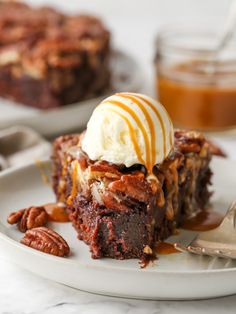 a slice of pecan brownie with ice cream on top