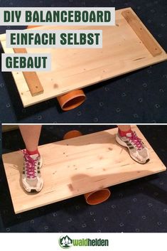 a person standing on top of a wooden board