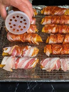 the meat is being prepared on the grill