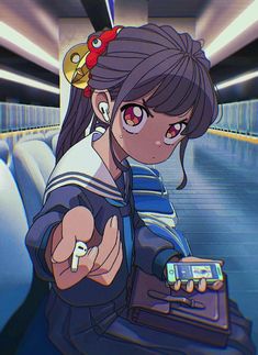 an anime character holding a cell phone and pointing to the screen with her finger on it