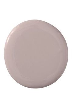 a white plate with a light pink color on the top and bottom, against a white background