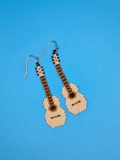 "These cute earrings measure approximately 2.5\" long.  Hand beaded with delica 11/0 beads.  Come on stainless steel earwires." Guitar Earrings, Bead Jewelry, Hand Beading, Cute Earrings, Acoustic Guitar, Beaded Earrings, Jewelry Earrings Dangle, Beaded Jewelry, Etsy Earrings