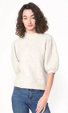 SUSTAINABLE - made from recycled polyester this eco-friendly sweater features exaggerated puff sleeves and a ribbed collar.  Puff sleeve knit  Turtleneck  Ribbed  Sustainable sweater  Length:  22 1/2" Chest: 17" 50% Recycled Polyester, 20% Acrylic, 18% Nylon, 10% Wool, 2% Spandex  Hand wash in cold water with similar c Short Sleeve Sweaters, Knit Puff Sleeve, Luxury Women Fashion, Cozy Knit, Puff Sleeve Top, Short Sleeved Sweaters, Cozy Knits, Black Booties, Puff Sleeves