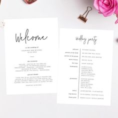 two wedding programs on top of a table next to pink flowers and a bottle of wine