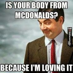 a man wearing a suit and tie with words on it that say, is your body from mcdonalds? because i'm loving it