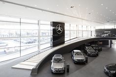 a car showroom filled with lots of cars