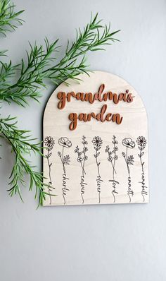 a wooden sign that says grandma's garden on it