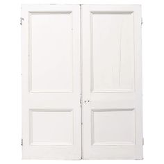 an open white door with two panels on each side and one panel at the top