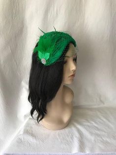 Perfect time for Wedding look, This is a classy vintage inspired 1950s - 1960s Green half hat with a modern touch perfect as a bridal fascinator hat, wedding hat, tea party hat, church hat or any other special occasion. This is a green felt headpiece create by hand and has a wire base that can fit any head size comfortably. WHAT MAKES THIS SO UNIQUE I form each piece while on my head to see how it fits and looks and then take it off and hand sew each piece. I design it to wear both ways so there Vintage Headband Costume Hat For Party, Vintage Costume Headband For Party, Vintage Adjustable Fascinator Headband, Gatsby Style Fascinator For Vintage Events, Vintage Mini Hat Headband For Parties, Gatsby Style Party Headband Hat, Adjustable Retro Headpiece For Evening, Flapper Hat Headpiece For Party, Vintage Fitted Headpieces For Party