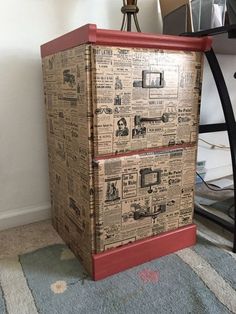 an old newspaper file cabinet is sitting on the floor