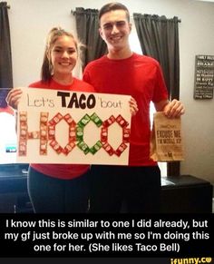 two people holding up a sign that says let's taco bout hoo