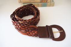 Lovely braided leather belt, made in Italy. Length with buckle approx. 43 inches | 110 cm. Width approx. 2.1 - 2.3 inches | 5.5 - 6 cm. In good vintage condition, but does show some signs of use/wear. ∞ Please remember this is a vintage item and will show some signs of use or wear. If you are in doubt as to the condition of the item please ask for clarification before you purchase. ∞ Color in photos may vary slightly depending on light and screen. ∞ If you buy multiple items from my shop, I may Brown Leather Rope Belt, Brown Woven Leather Belt, Vintage Pearl Brooch, Vintage Leather Belts, Braided Leather Belt, Beautiful Handwriting, Belt Brown, Vintage Leather Bag, Amber Earrings