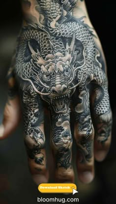 a person with tattoos on their hands and hand