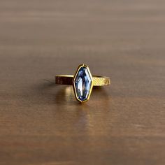 An Art Deco-style engraved band grandly elevates a dreamy ombré sapphire in this sublime ring.

22k & 18k yellow gold 
Sapphire, 2.02ct, 6mm x 12mm (1/4" x 1/2")

RING SIZE:

6.75 Sapphire Art Deco Ring, Ombre Rings, Newport Ri, Deco Style, Bracelet Gift, Ring Necklace, Art Deco Fashion, Sapphire Ring, Jewelry Shop