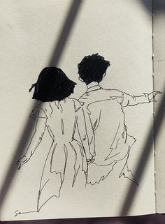 a drawing of two people facing each other