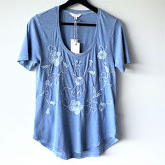 Lucky Brand Floral Embroidered T-Shirt Round Neck. Short-Sleeve. Floral Embroidered. Ash/Washed Blue. Boho. Vintage. Cotton. Machine Wash. * New With Tags * Size: S * Style: 7w64539 * Color: Washed Blue * Armpit-To-Armpit 17 3/4", Length Front 23 3/4" / Back 25 1/4" If You Have Any Questions, Please Let Me Know. Relaxed Fit Floral Embroidery Tops With Crew Neck, Relaxed Fit Floral Embroidered Crew Neck Tops, Relaxed Fit Crew Neck Tops With Floral Embroidery, Casual Embroidered Short Sleeve Top For Spring, Casual Crew Neck Top With Embroidered Hem, Relaxed Fit Embroidered Crew Neck Top For Spring, Summer Crew Neck Tops With Floral Embroidery, Spring Cotton Embroidered Crew Neck Top, Spring Floral Embroidered Short Sleeve Tops