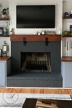 a living room filled with furniture and a flat screen tv mounted above a fire place