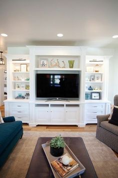 the living room is clean and ready to be used as a tv stand or entertainment center