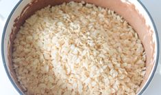 a pot filled with rice sitting on top of a table