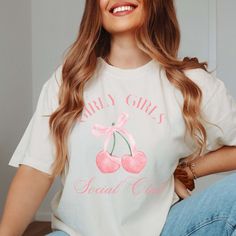 Indulge in the spirit of femininity and fun with our Girly Girls Social Club Comfort Color Tee. Designed for those who embrace their girly side with pride, this tee is a celebration of all things pink, sparkly, and fabulous. Featuring a charming design with the words "Girly Girls Social Club" adorned in stylish lettering, this tee is a playful addition to any wardrobe. Made with premium Comfort Color fabric, it offers unmatched softness and durability, ensuring comfort all day long. Whether you' School Club Shirts, Girls Squad, All Things Pink, Sweater Hat, Pink Sparkly, Trendy Graphic Tees, Los Angeles Style, Club Shirts, Comfort Colors Tee