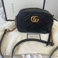 Gucci Marmont Mini Shoulder Bag, Black Leather Gg Antique Gold Hardware And Gg On Back Original Hardware On Strap 7”W X 5”H X 2.5”D Comes With Original Dust Bag And Box Interior Open Pocket, Suede Made In Italy - 100% Authentic In Perfect Condition, Message Me For More Pics! Gucci Marmont Mini, Gucci Marmont, Shoulder Bag Black, Mini Shoulder Bag, Gucci Bag, Antique Gold, Gold Hardware, Dust Bag, Black Leather