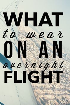 an airplane wing with the words what to wear on an overnight flight written below it