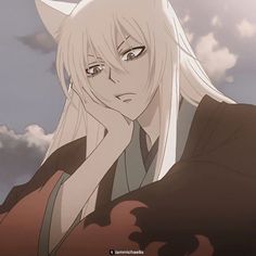 an anime character with long white hair and blue eyes