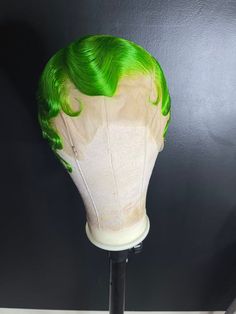 This high quality custom wig is made using a Body Wave textured Wig with a 13 by 4 frontal space. Wig comes bleach knotted, plucked and styled as picture. Bands are included for Glue-less install options.  Medium wig cap (22” circumference)Color: Lime green, Lavender Good to know about your high quality hairPlease note that intense exposure to heat and chemicals may potentially damage and alter the texture of your locks, so please protect your hair and always consult with a professional.What to Finger Wave Wig, Medium Wig, Wigs Collection, Short Cut Wigs, Finger Wave, Drag Wigs, Y2k Makeup, Brazilian Hair Wigs, Hat Jewelry