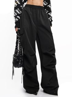 These cargo pants provide a loose fit that's perfect for street wear fashionistas. Featuring an elastic waist, they offer maximum comfort and a stylish look. Made of breathable fabric, they're great for all-day wear. Black Cargo Pants Women, Full Length Pants, Modern Womens Fashion, Black Cargo Pants, Female Clothing, Black Cargo, Straight Trousers, Cargo Pants Women, Pants Casual