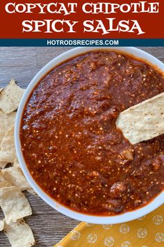 copycat chipotle spicy salsa in a bowl with tortilla chips