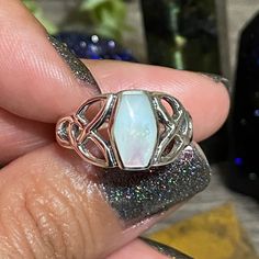 Sterling Silver Mother Of Pearl Ring Trinity Symbol On The Sides Of The Stone Sz 7 .925 Brand New White Opal Ring Stamped 925, Spiritual White Crystal Ring In Sterling Silver, Trinity Symbol, Mother Of Pearl Ring, 7 Rings, The Stone, Pearl Ring, Womens Jewelry Rings, Mother Of Pearl