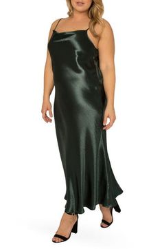 Textured satin shines with unparalleled elegance on this bias-cut slipdress that gracefully drapes your figure and flirtingly flutters around your ankles. 54" length Slips on over head Cowl neck Adjustable straps Unlined 65% Tencel® lyocell, 35% polyester Tencel lyocell is a sustainably produced fiber made with closed-loop processing Machine wash, tumble dry Imported Women's Clothing Slip Dress Outfit Winter, Silk Cowl Neck Dress, Slip Dress Outfit, Dresses Materials, Forest Green Dresses, Winter Dress Outfits, Midi Slip Dress, Cowl Neck Dress, Maxi Slip Dress